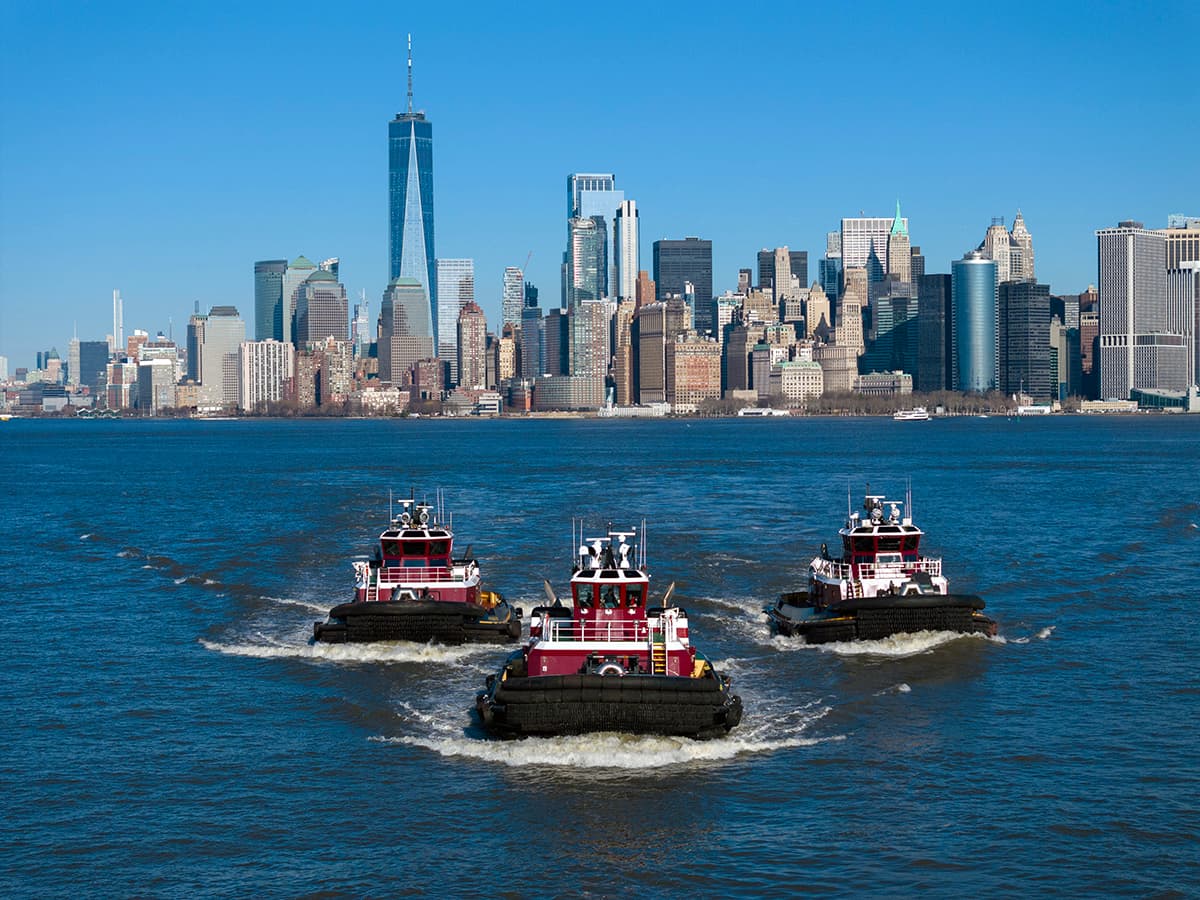 The Ava, Capt. Brian and Ava McAllister in New York harbor.  The three tugs are certified as low emission vessels by ABS.