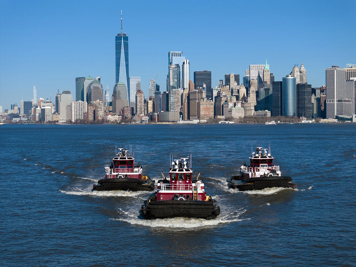 The Ava, Capt. Brian and Ava McAllister in New York harbor.  The three tugs are certified as low emission vessels by ABS.