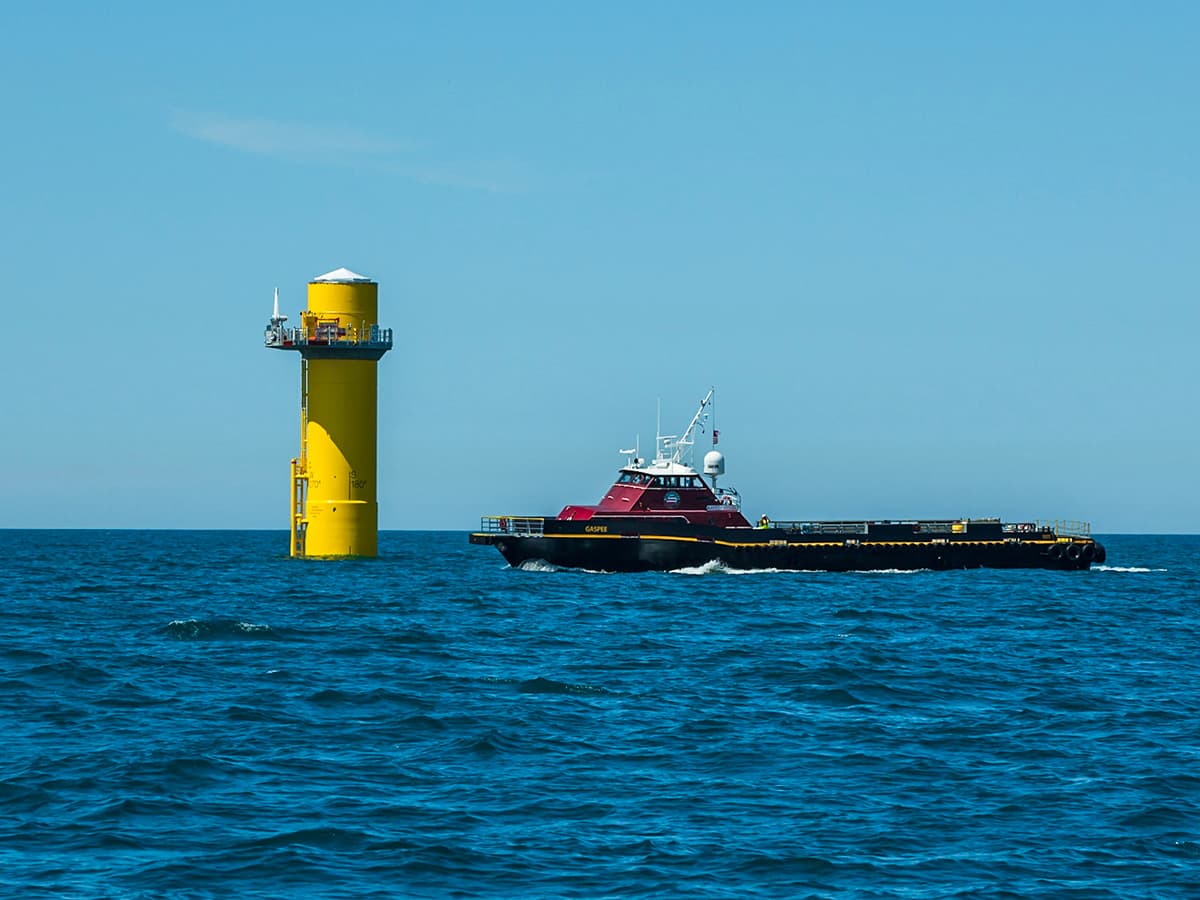 The CTV Gaspee is shown next to a monopile at a new windfarm installation off the coast of Virginia.