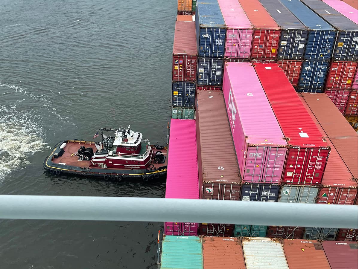 McAllister tugs assist the container ship One Stork. The One Stork becomes the largest container ship to arrive in Jacksonville, Florida.